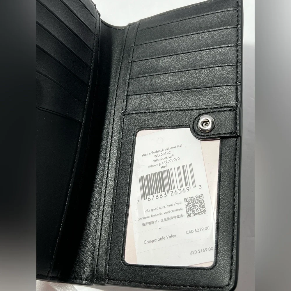 Kate Spade New York large‎ slim bifold wallet